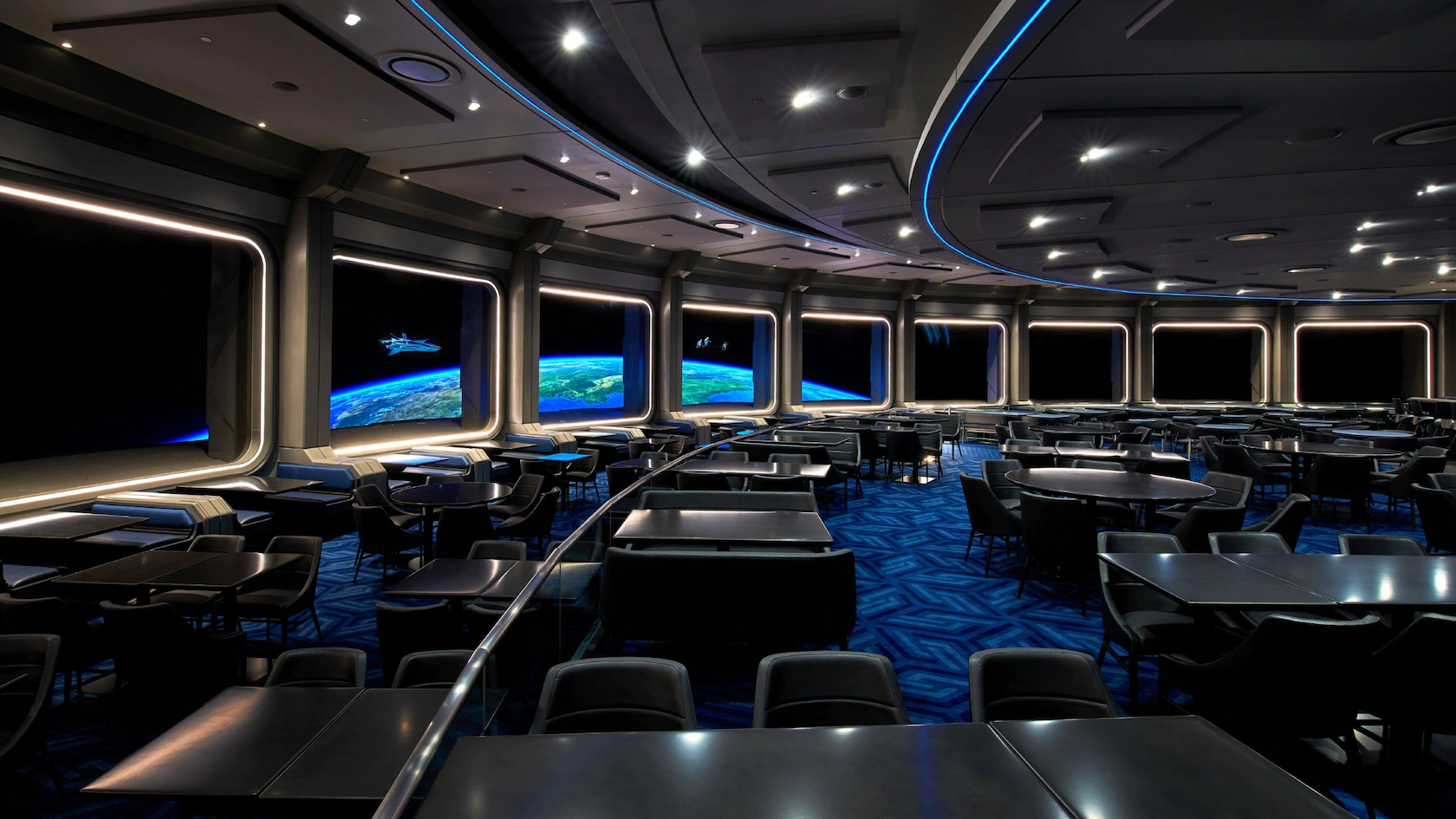 Internal picture of Space220 Restaurant Disney World. Circular walls with large windows simulating outer space